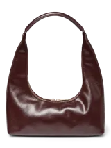 Bolso de hombro de efecto cuero color marrón oscuro (Port Royale), con forma de media luna y asa única. Presenta un acabado brillante y un tirador de cremallera metálico dorado.