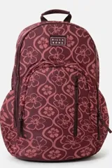 Mochila Billabong Roadie de color bordó con estampado floral y geométrico, compartimento principal con cierre, bolsillo frontal con cierre y asa superior.