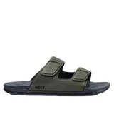 Sandalias Reef Cushion Tradewind color verde con base negra y correas ajustables con velcro.