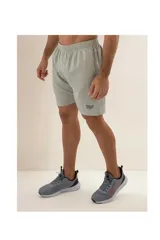 Short de baño Everlast color crudo, con cintura elástica y logo de la marca estampado en la pierna izquierda.