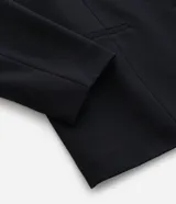 Blazer de corte slim alargado confeccionado en tejido punto roma, con cierre frontal de dos botones y solapas clásicas.