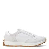 Championes urbanos blancos con detalles en gamuza gris y suela de goma color caramelo.