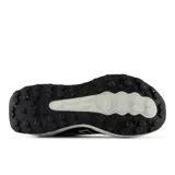 Championes de trail running New Balance modelo Garoé v2 para mujer, color negro con entresuela blanca Fresh Foam X y suela con tecnología AT Tread.
