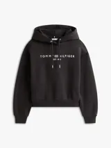 Buzo con capucha y cordón ajustable de Tommy Hilfiger, color negro, de corte amplio y hombros caídos con el logo de la marca bordado en el pecho.