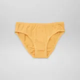 Pack de siete bombachas de corte clásico, confeccionadas en algodón liso en una variedad de colores pasteles y neutros, incluyendo amarillo, blanco, azul marino, rosado, lila, terracota y celeste.