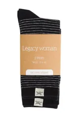 Pack de dos pares de medias de mujer, talle 35 a 40. Un par es negro con rayas horizontales blancas y el otro par es negro con puntos blancos.