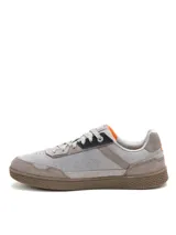Championes Cat modelo Pause, de diseño retro y minimalista en tonos grises. Confeccionados en una combinación de gamuza y lona, cuentan con suela de goma texturizada y cierre mediante cordones.