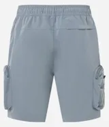 Bermuda cargo color terracota con cintura elástica y cordón de ajuste. Presenta múltiples bolsillos tácticos laterales con cierre y recortes decorativos.