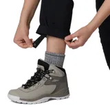 Pantalón convertible de senderismo color negro, con perneras desmontables mediante cremallera que permiten transformarlo en shorts. Cuenta con bolsillos laterales y traseros, diseñado con tecnología de protección solar.