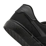 Championes urbanos Reebok Court Advance Vulc, color negro total, con diseño de caña baja, cierre de cordones y suela vulcanizada.