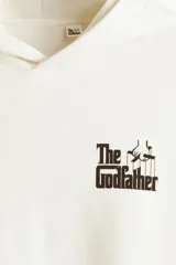 Canguro color blanco con capucha, bolsillo frontal tipo canguro y pequeño estampado frontal inspirado en The Godfather.