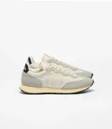 Championes urbanos Veja modelo Rio Branco II, con diseño retro en tonos beige, gris y detalles en negro. Confeccionados en una combinación de gamuza y tejido técnico, con el logo lateral característico y suela de goma en tono crema.