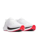 Championes de running Under Armour modelo Charged Rogue 5, color blanco con detalles en negro y suela roja. Presentan una parte superior de malla técnica transpirable, entresuela Charged Cushioning para mayor amortiguación y suela de goma resistente.