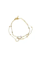 Collar doble dorado con dijes de mariposa calada, trébol blanco y corazones con strass.