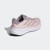 Championes de running Adidas Response, color rosa pálido con detalles en gris lila y tres franjas laterales en tono rosado metálico. Cuentan con mediasuela de EVA blanca y suela exterior de caucho negra.