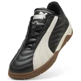 Championes urbanos Puma modelo Tifosi Calcio, color negro con la icónica franja lateral en blanco y suela de goma color caramelo. Diseño inspirado en el fútbol clásico con capellada de cuero sintético.