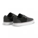 Championes Etnies Blitz grises con detalles en negro y suela blanca.