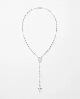 Gargantilla tipo rosario de plata 925, con cadena de eslabones y pequeñas cuentas intercaladas. Cuenta con una medalla colgante de la Virgen Milagrosa y un dije final en forma de cruz.