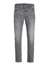 Jean gris de tiro alto y corte relajado, con cierre de botones y acabado stonewash.