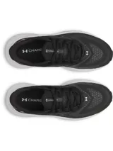 Championes de running Under Armour Turbulence 3, color negro con suela blanca. Presentan parte superior de malla de doble capa para mayor transpirabilidad y mediasuela con amortiguación Charged+ para una pisada suave y reactiva.