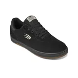 Championes de skate Etnies Joslin X Bones, color negro con logo en blanco y suela marrón.
