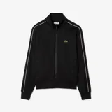 Campera deportiva Lacoste de corte regular, color negro con cierre frontal completo y cuello alto. Presenta detalles de líneas blancas en los hombros y mangas, puños y ruedo acanalados, y el logo del cocodrilo bordado en el pecho.