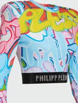 Top corto de manga larga con hombreras y estampado de graffiti multicolor. Tiene una banda elástica negra en la cintura con el logo de la marca.
