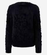 Suéter negro de poliamida con textura animal print y pelitos artificiales.