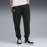 Pantalón de jogging Puma de la colección Aston Martin Formula One Team, color negro, con cintura elástica, puños acanalados en los tobillos y logos de la marca y del equipo estampados en el muslo derecho.