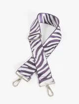 Correa de tela para cartera con estampado de cebra en tonos blanco y lila.