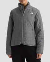 Campera gris acolchada con cierre frontal, cuello alto con interior de piel sintética y logo de la marca bordado en el pecho.