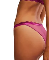 Bombacha tipo colaless de malla celeste con lunares y bordes de encaje ondulado.