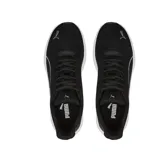 Championes Puma Transport Modern Running color gris, con detalles en blanco y suela blanca.