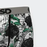Calzoncillos bóxer de hombre marca PSD, con estampado de billetes de dólares, rosas blancas y negras, y cadenas plateadas.