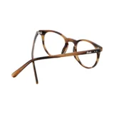 Lentes de receta con armazón de eco acetato en tono carey con acabado veteado y diseño redondeado.