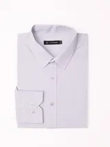 Camisa de vestir de manga larga con estampado de microdiseño, cuello clásico y cierre frontal con botones. Confeccionada en tejido liviano.