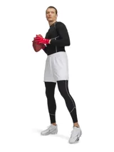 Calza deportiva larga Under Armour modelo HG Elite de color negro, con cintura elástica ancha y detalles de líneas reflectantes en la parte inferior de las piernas.