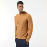 Sweater de punto fino con cuello redondo, diseño liso y mangas largas con puños acanalados.