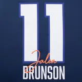 Musculosa de básquet azul marino con detalles laterales en naranja. Presenta el logo oficial de los New York Knicks estampado en el frente y etiqueta de autenticidad NBA en el ruedo.