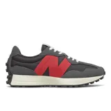 Championes New Balance 327, color gris y negro con detalles en rojo y suela blanca.