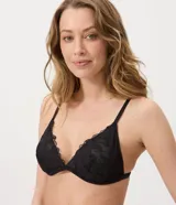 Soutien top de tul negro con transparencia, escote en V, breteles finos regulables y delicado bordado floral.