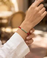 Pulsera de cuentas de cristal rojo y piedras turquesa, con separadores de plata 925.