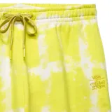 Pantalón de jogging amarillo con estampado de cuadrados y estrellas blancas.