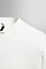 Camiseta regular fit de algodón color blanco, con cuello redondo, manga corta y logo en relieve en el bajo, de la línea Zara Athleticz.