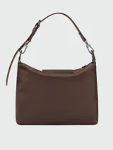 Cartera hobo grande Longchamp de la línea Le Pliage Xtra, confeccionada en cuero color gris claro, con solapa frontal con cierre de botón a presión y correa ajustable para el hombro.