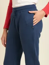 Pantalón tipo babucha de algodón y poliéster, color azul marino, con cintura elástica ajustable mediante cordón y corte recto.