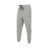 Pantalón de jogging Jordan Essential color gris melange, con cintura elástica ajustable mediante cordón, bolsillos laterales y puños elásticos en los tobillos. Presenta el logo Jumpman bordado en la parte superior izquierda.
