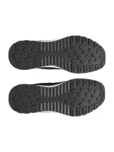 Championes Under Armour Street Mirage, color negro con suela blanca, de parte superior en malla ligera y transpirable con superposiciones de gamuza resistente y entresuela de EVA acolchada.