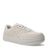 Championes urbanos color beige con detalles en blanco.