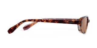 Lentes de sol con montura ovalada de diseño carey y lentes polarizadas en color marrón. Cuentan con protección UV400 y recubrimiento resistente a rayaduras.